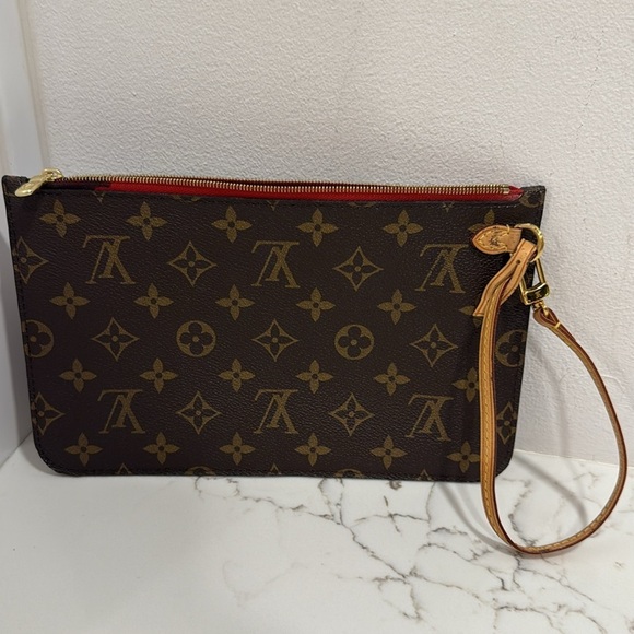 Louis Vuitton Handbags - Louis Vuitton  Accessory Neverfull pouch/clutch